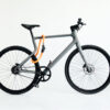 Flexibel textielslot tex-lock orbit  in orange op een urwahn fietsframe en banden